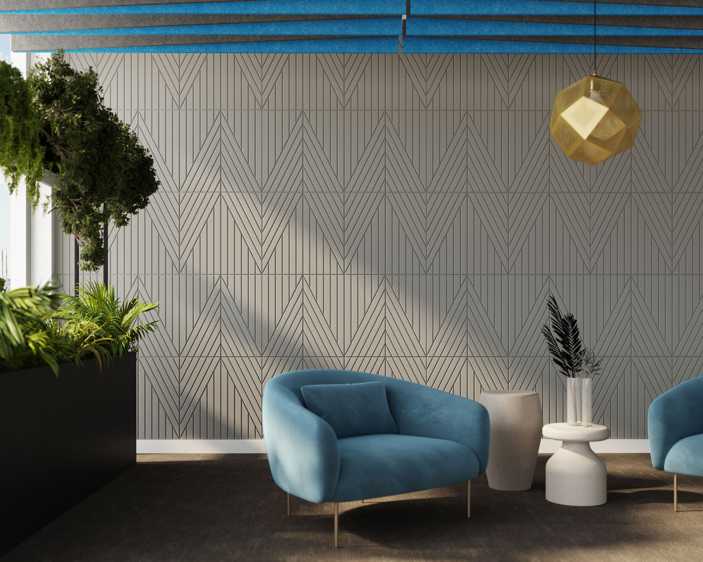 A modern interior features teal armchairs, white side tables, and a grey geometric patterned acoustic felt wall tile. A gold pendant light hangs above. Green plants are placed on the left, adding a touch of nature to the sleek design. Blue ceiling panels are also visible.