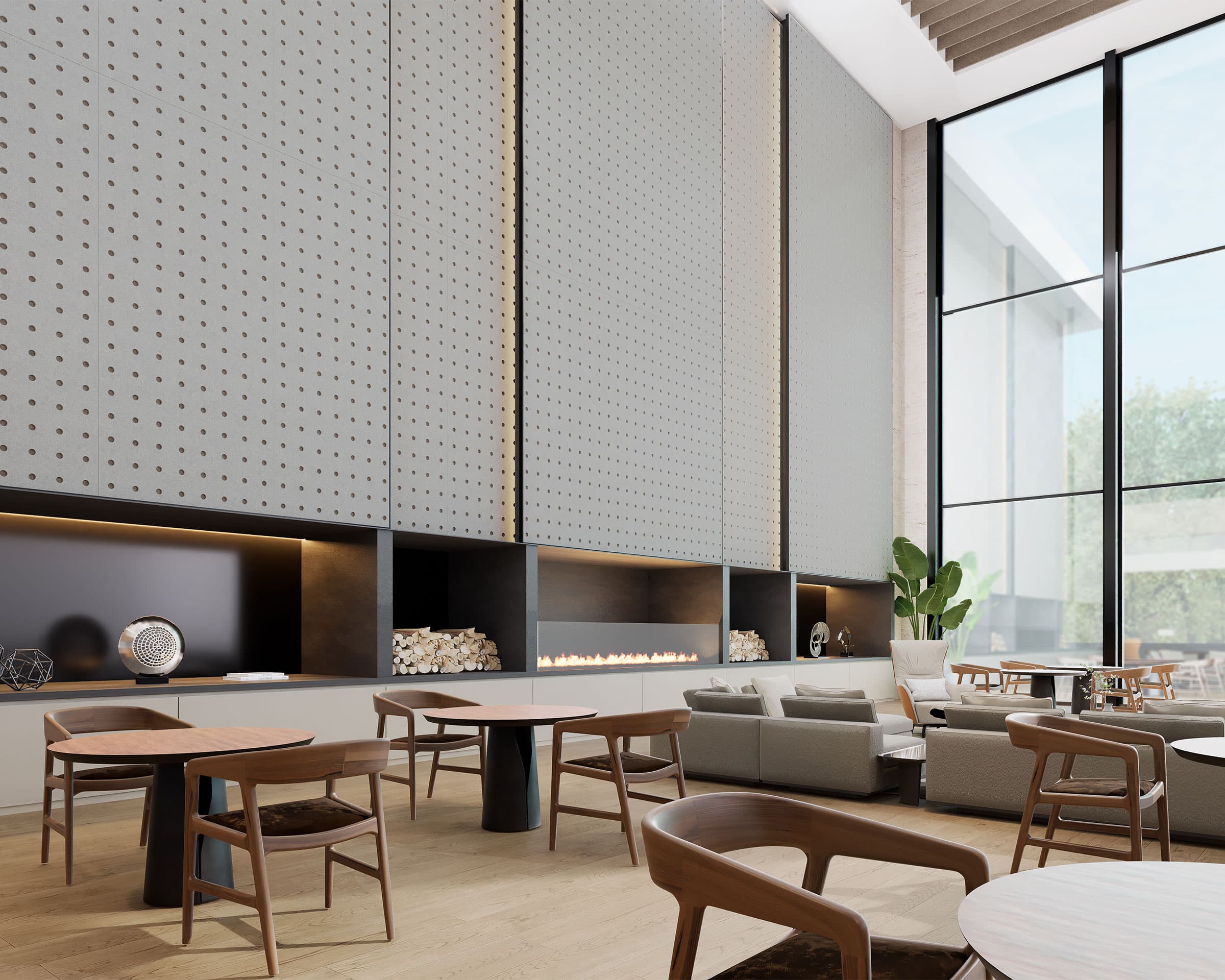 Modern lounge with a high ceiling, floor-to-ceiling windows, and minimalist decor. Features gray circle acoustic felt wall panels, wooden tables and chairs, a gas fireplace, light hardwood flooring, and potted plants. Natural light fills the space, creating a cozy ambiance.