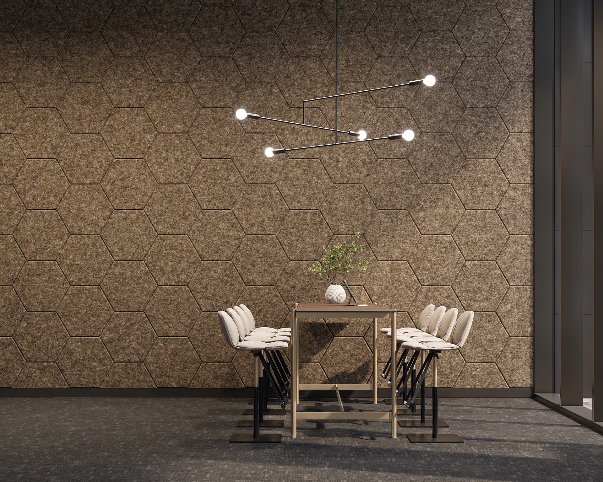 A modern conference room features a geometric acoustic felt hexagonal pattern wall, a rectangular high table with a light wood finish, and eight white high-backed chairs. A sleek, contemporary chandelier with exposed bulbs hangs above the table, and a plant in a vase serves as a centerpiece.