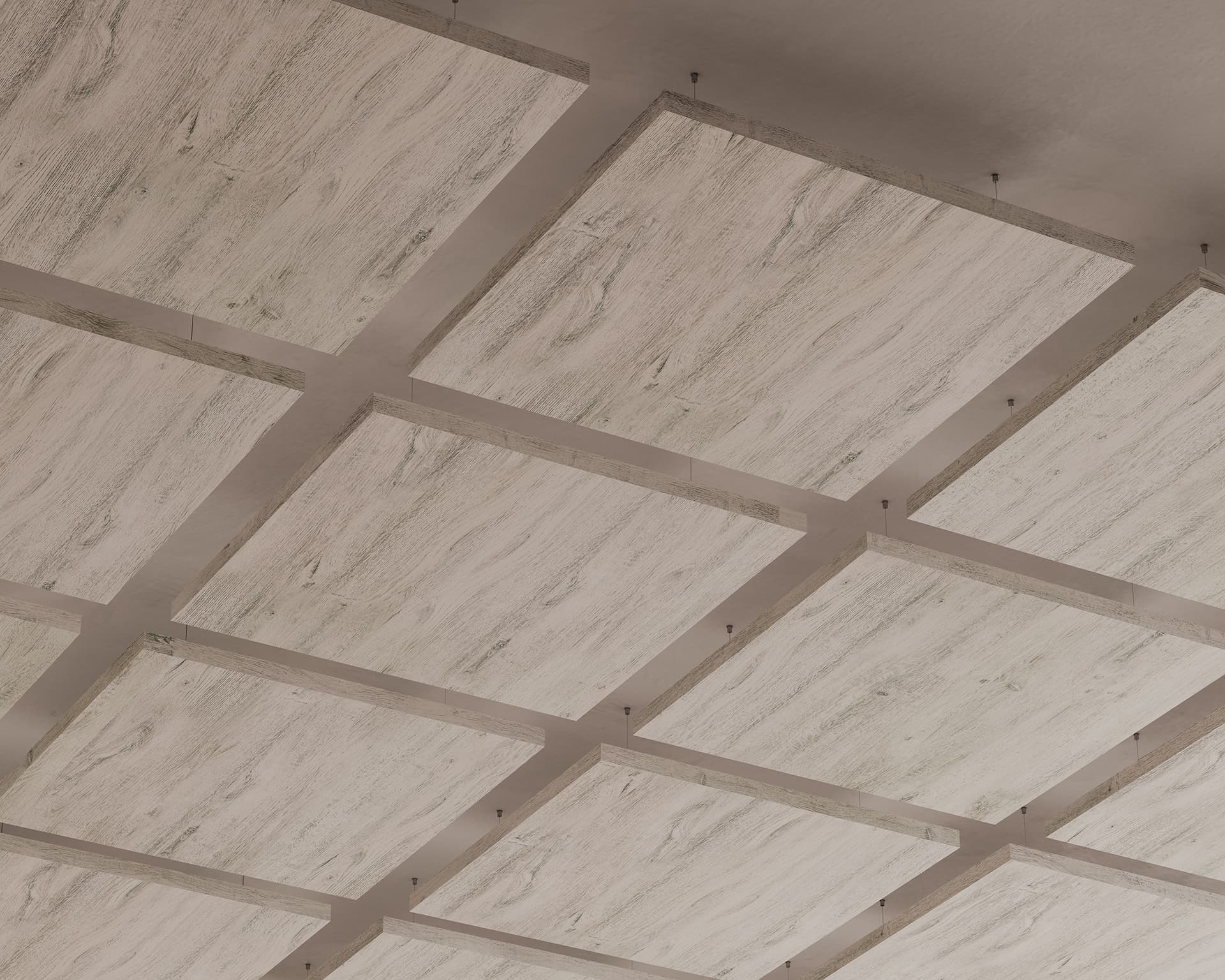 A close-up view of a ceiling with large, square, textured acoustic felt panels arranged in a grid pattern. The panels have a light, weathered appearance, and are suspended with small metal rods at the corners. The overall look is modern and rustic.