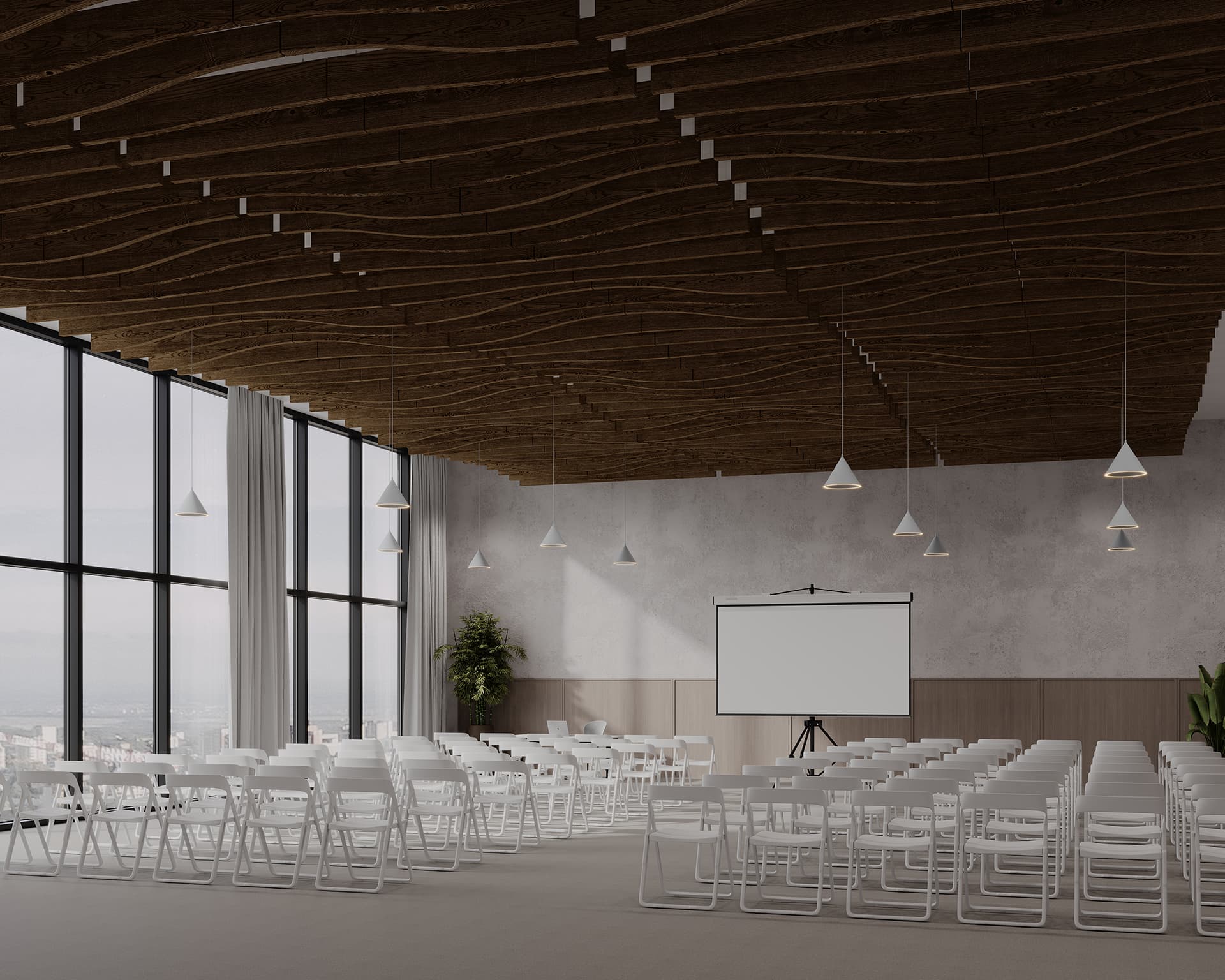 A spacious conference room with a wave-like acoustic felt woodgrain ceiling, large floor-to-ceiling windows, and rows of white chairs facing a projector screen at the front. Pendant lights hang from the ceiling, and potted plants are placed around the room.