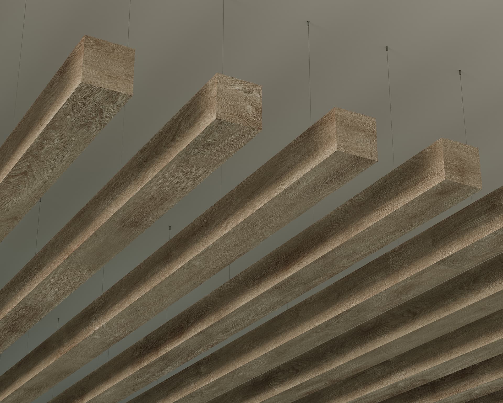Close-up view of several woodgrain ceiling beams hanging parallel to each other from the ceiling with thin wires against an olive green background, showcasing the intricate woodgrain and creating a geometric and minimalist design.