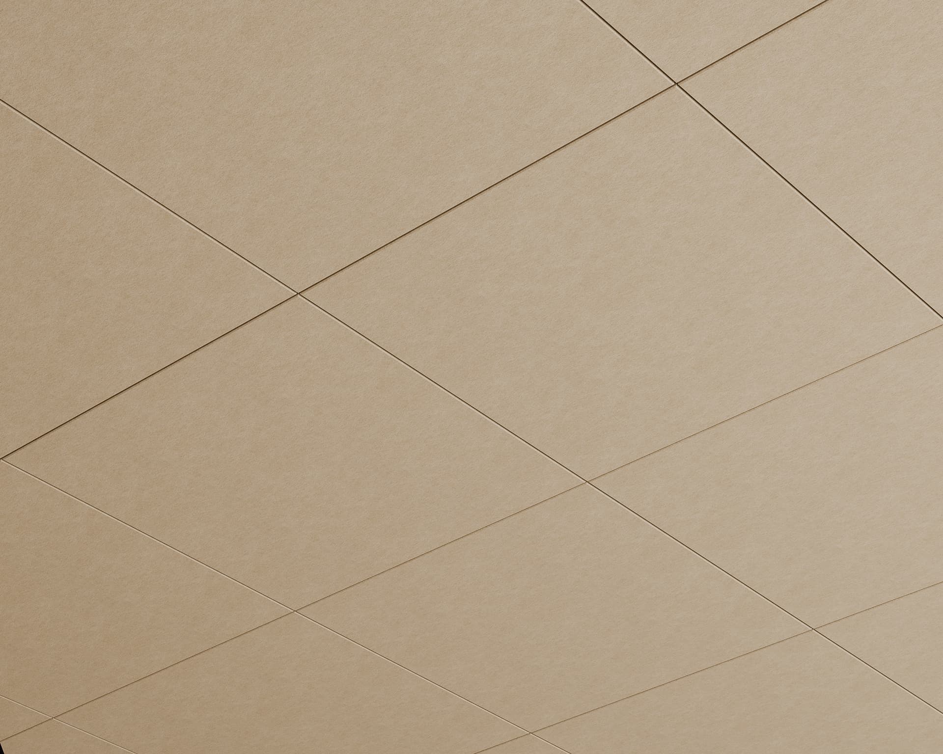 A close-up view of an acoustic felt beige-colored ceiling with intersecting lines forming diamond-shaped patterns. The geometric design creates a visually appealing grid across the surface.