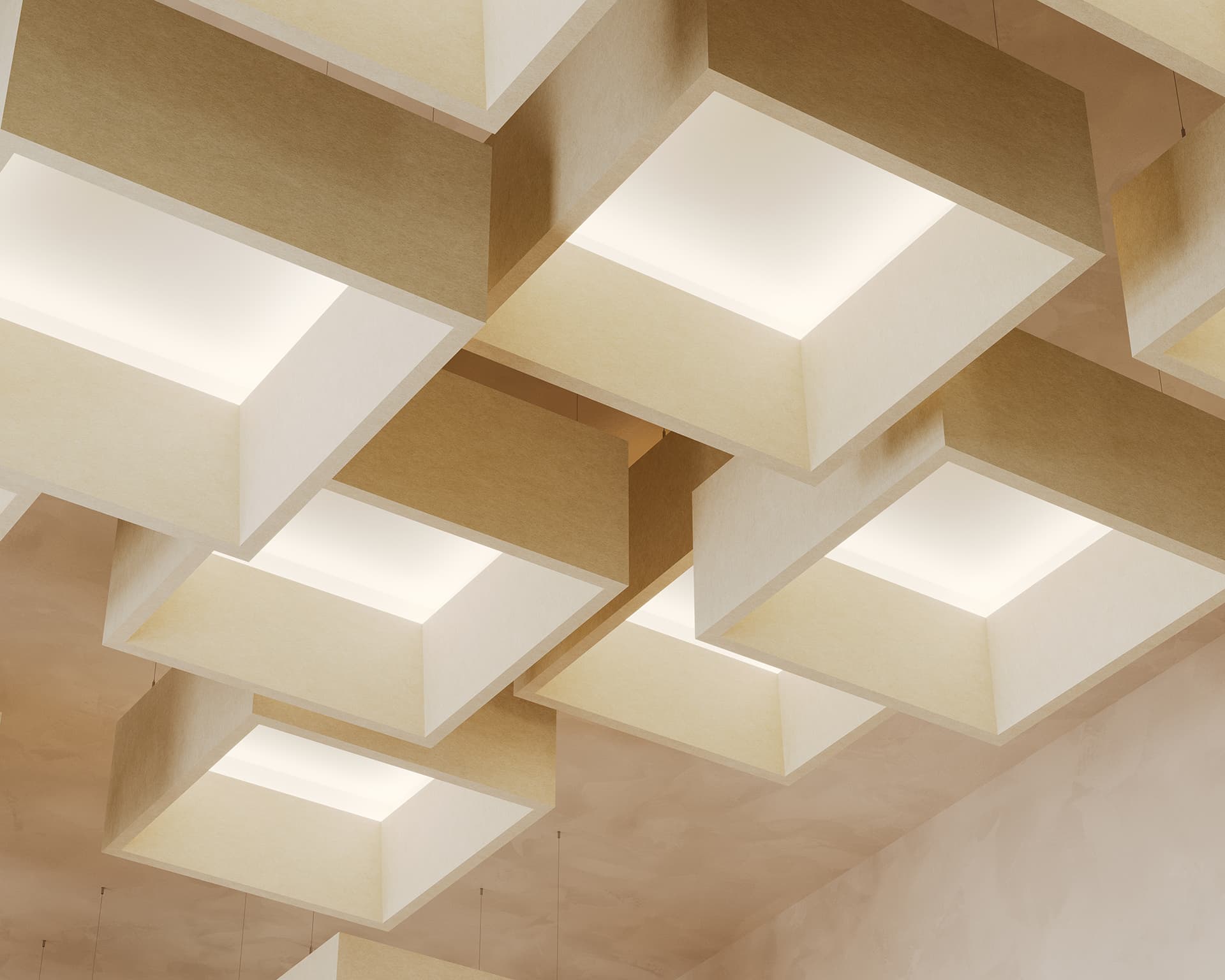 The image shows an acoustic felt ceiling with a modern design featuring several large, square, beige light fixtures. The lights are evenly spaced and appear to emit a soft, warm glow, contrasting with the pale textured background of the ceiling.