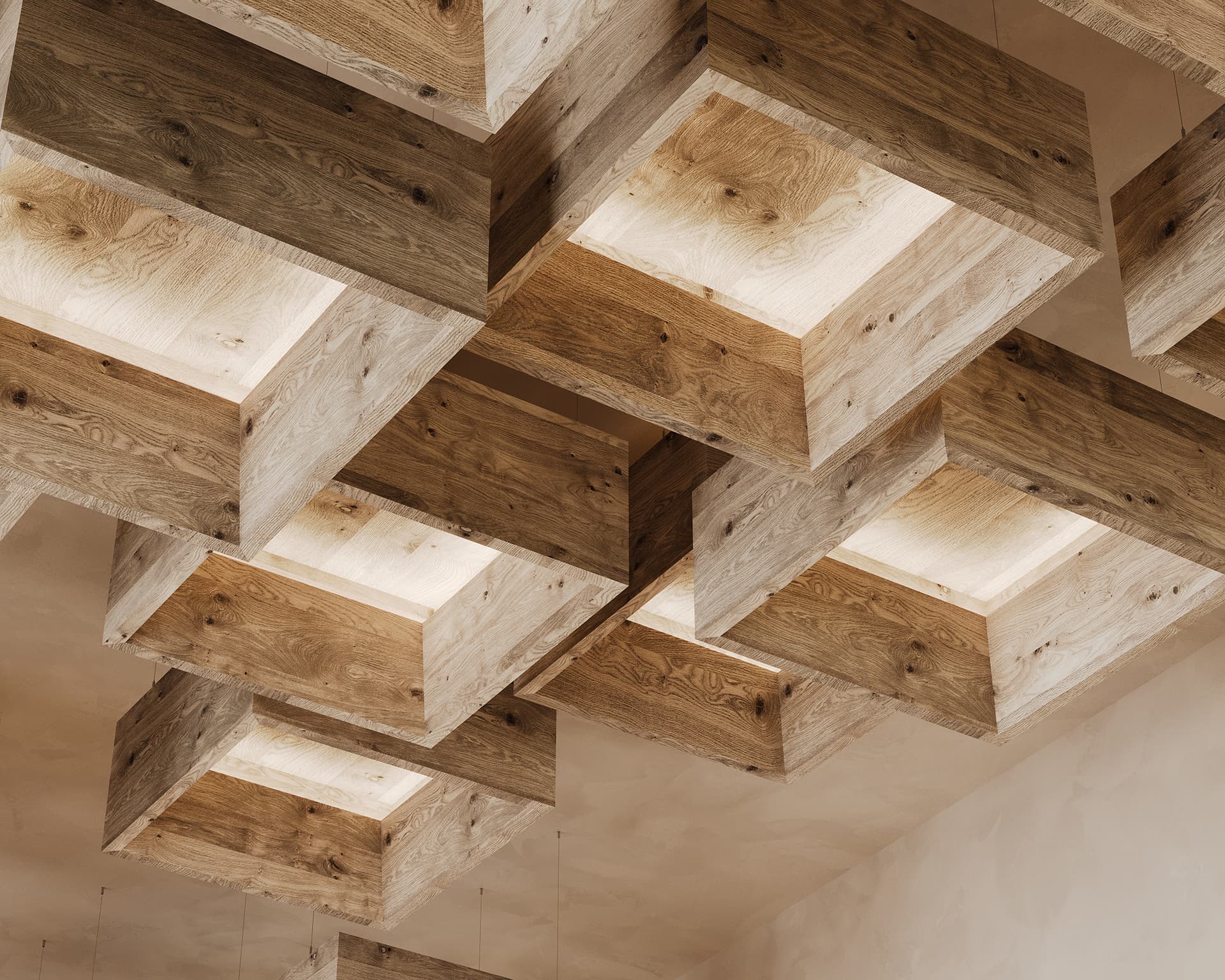 The image shows a ceiling with unique, box-shaped acoustic felt ceiling clouds. Each light fixture is a square box with a warm glow emanating from the center, creating a geometric and rustic aesthetic. The boxes are arranged in various depths.