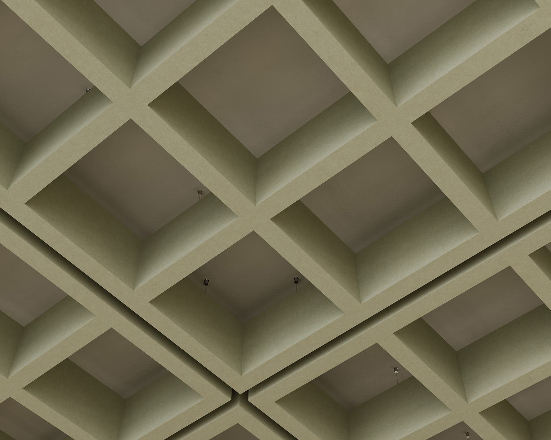 A geometric pattern of square, recessed acoustic felt panels creates a grid-like design on the ceiling. The panels are uniformly arranged, casting subtle shadows within each depression, and adding a sense of depth and texture to the ceiling's surface.
