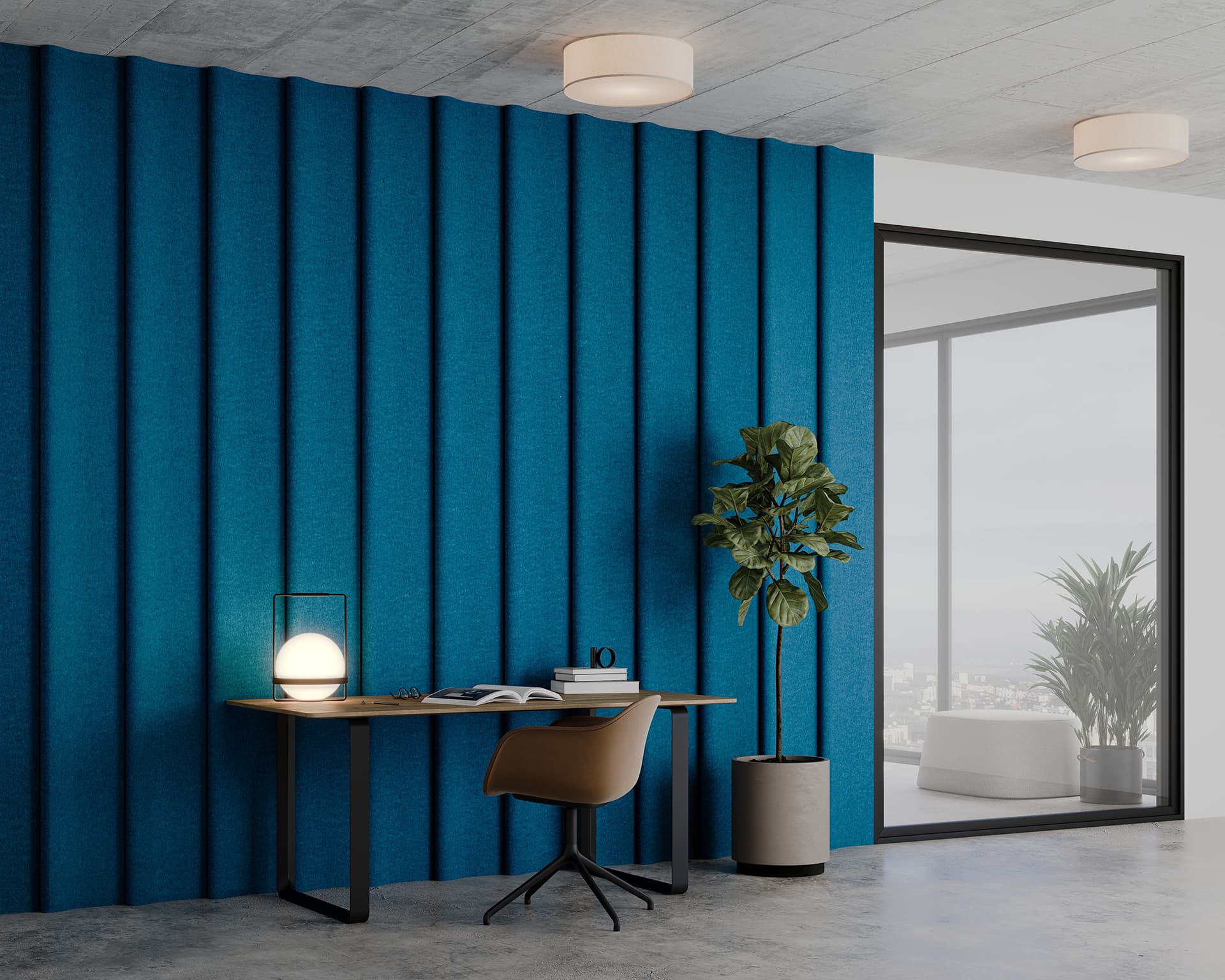 Modern office space with teardrop popup acoustic felt wall tiles adding a textured blue wall, a wooden desk, a brown swivel chair, and a decorative table lamp. A potted plant stands nearby, with a large window offering a view of the outdoors.