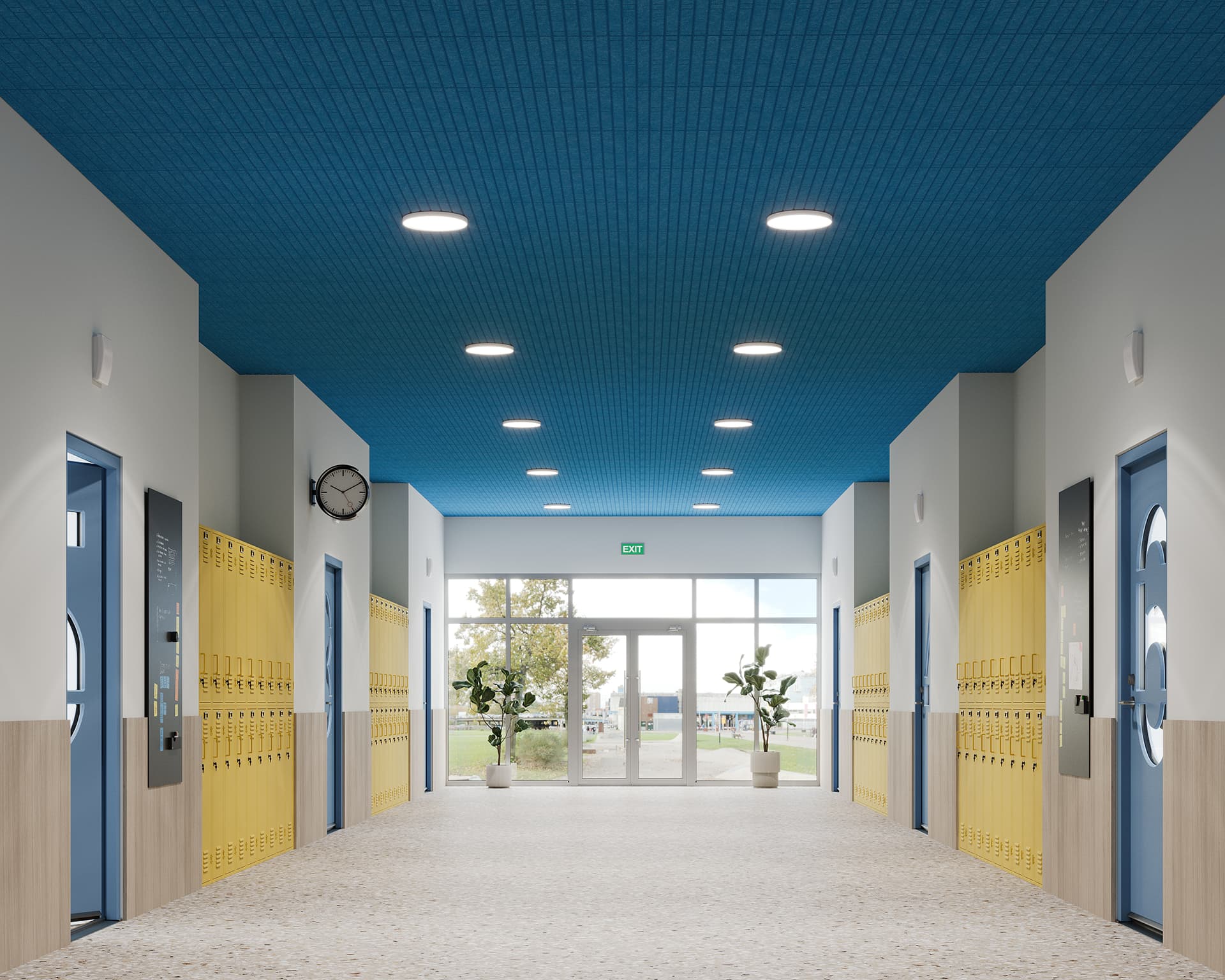 A bright school hallway with blue acoustic felt ceiling panels, beige walls, and yellow lockers on both sides. Two potted plants are near the exit, and a clock is mounted on the wall. Natural light pours in through the glass doors at the end.