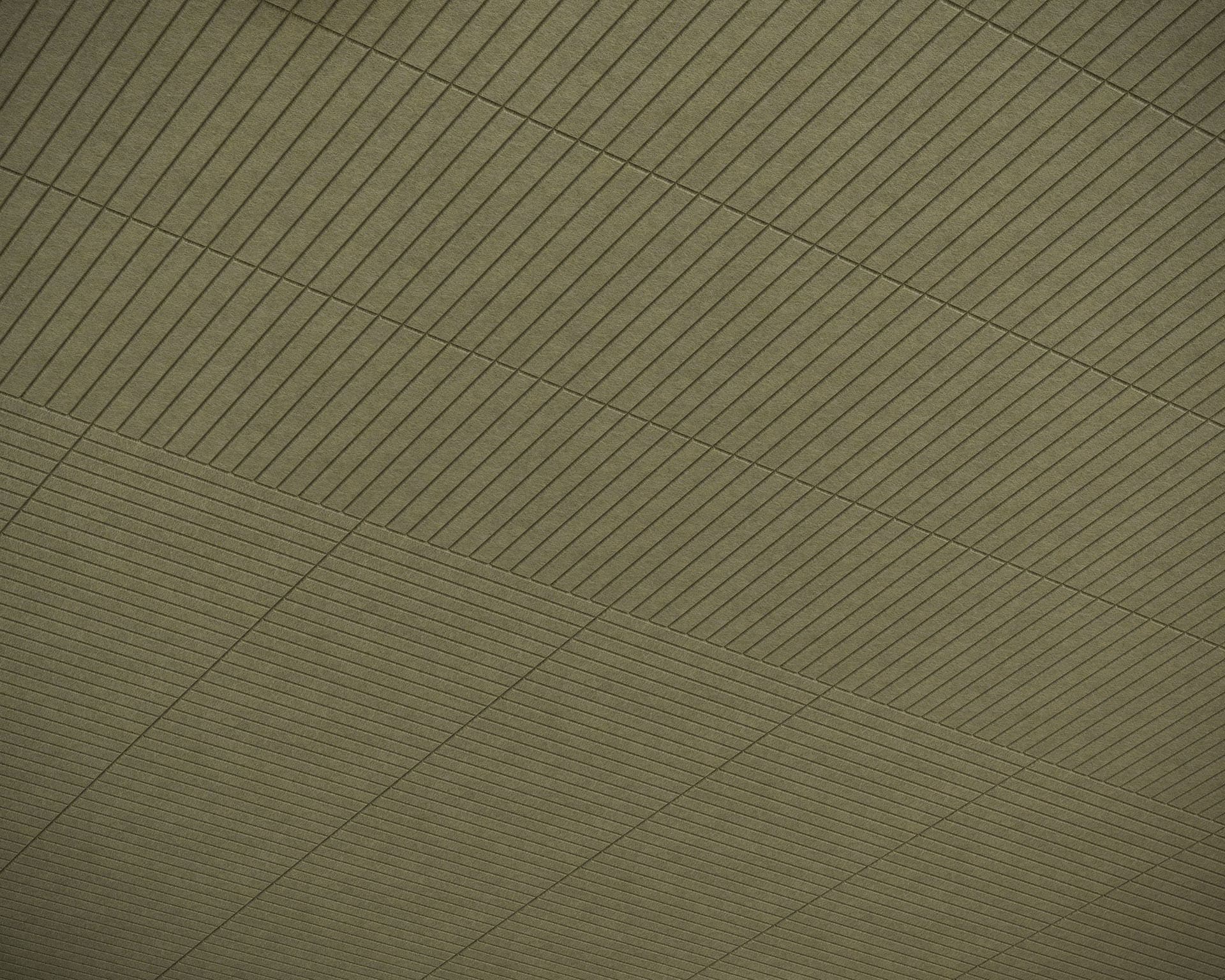 A diagonal split acoustic felt ceiling showcases an even contrast of textures. The upper section, adorned with narrow horizontal lines, meets the lower section of wider acoustic felt panels. Both halves boast a muted, earthy green tone for a harmonious ambiance.