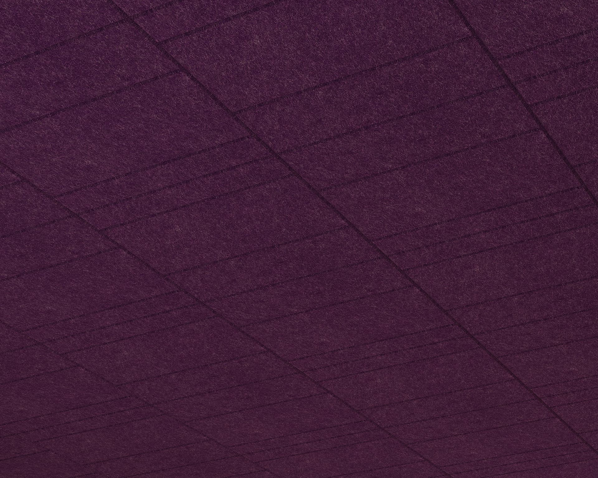 Close-up of a textured purple acoustic felt panels with horizontal and vertical stitch lines creating a grid pattern. The surface has a soft, wool-like appearance.