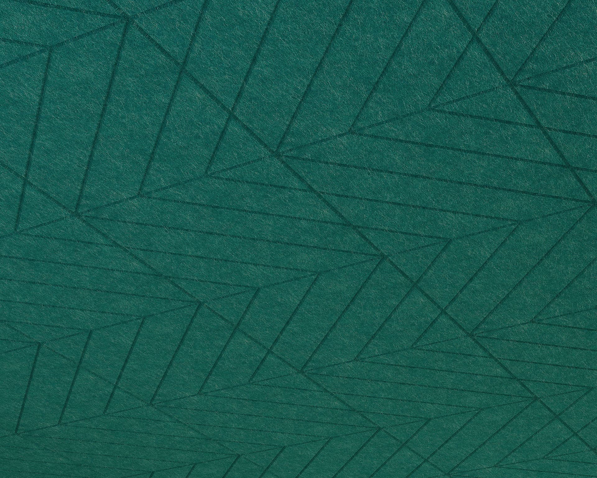 A textured green acoustic felt panel with an abstract geometric pattern of intersecting lines resembles fractured rays forming triangles and other shapes. The design creates a sense of depth and movement.