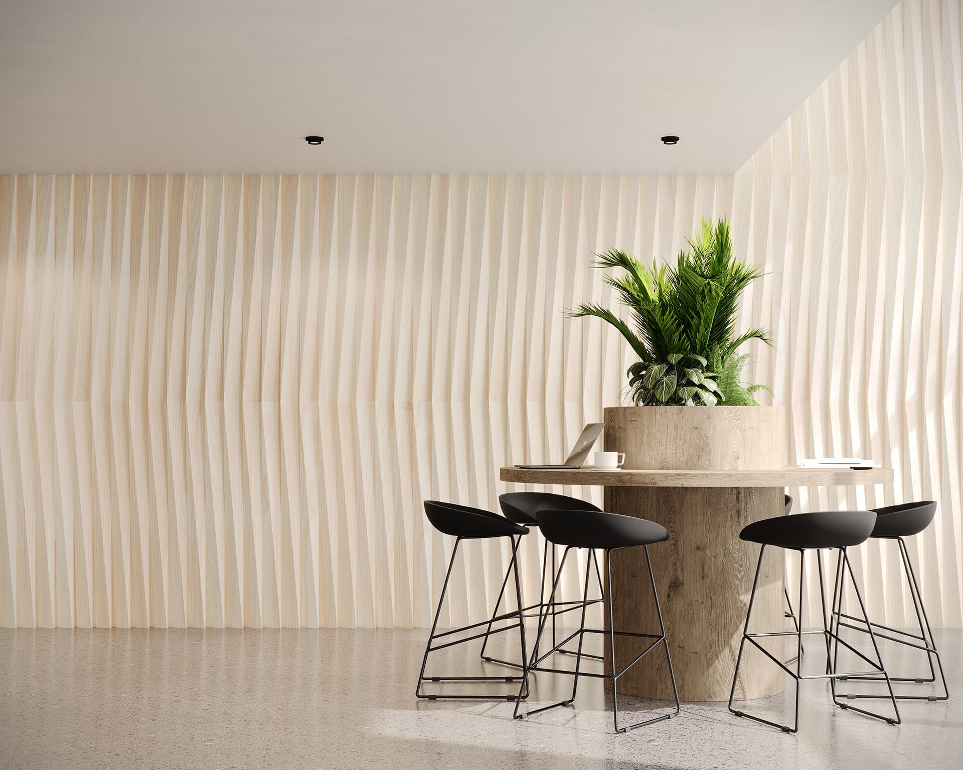 A modern minimalist room with a large potted plant on a round wooden table, surrounded by four black bar stools. The space features light acoustic felt walls with a wave pattern and smooth, speckled floor, enhanced by woodgrain textures that add depth and character to the serene ambiance.