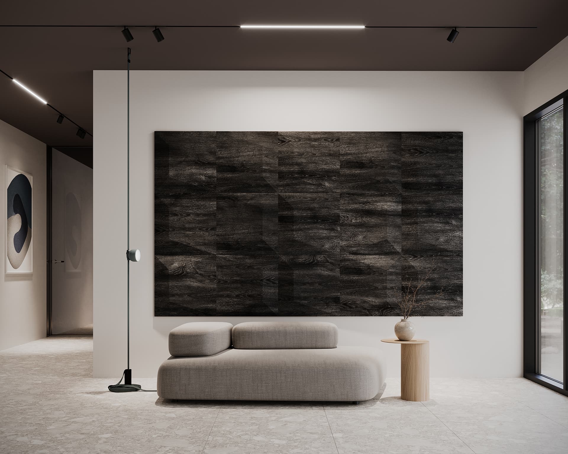 Minimalist living space with a neutral color palette features a large dark textured acoustic felt wall art piece. A modern gray bench is accompanied by a round wooden side table holding a vase. Natural light streams through a floor-to-ceiling window.