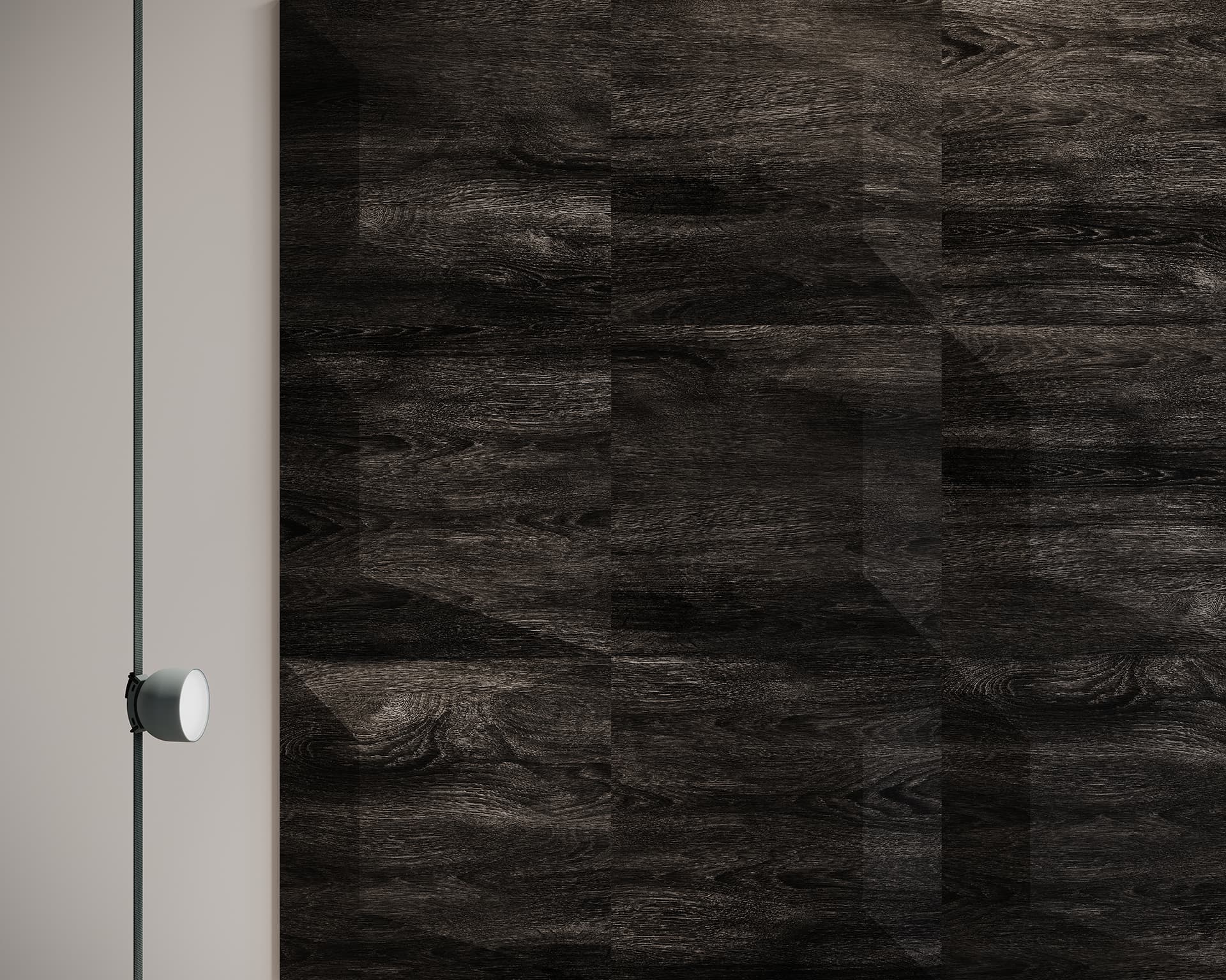 Close-up of a textured dark woodgrain acoustic felt tile with a vertical glass edge on the left. A round, white knob is attached to the glass, contrasting with the rich, natural woodgrain surface, reminiscent of elegant wall tiles.