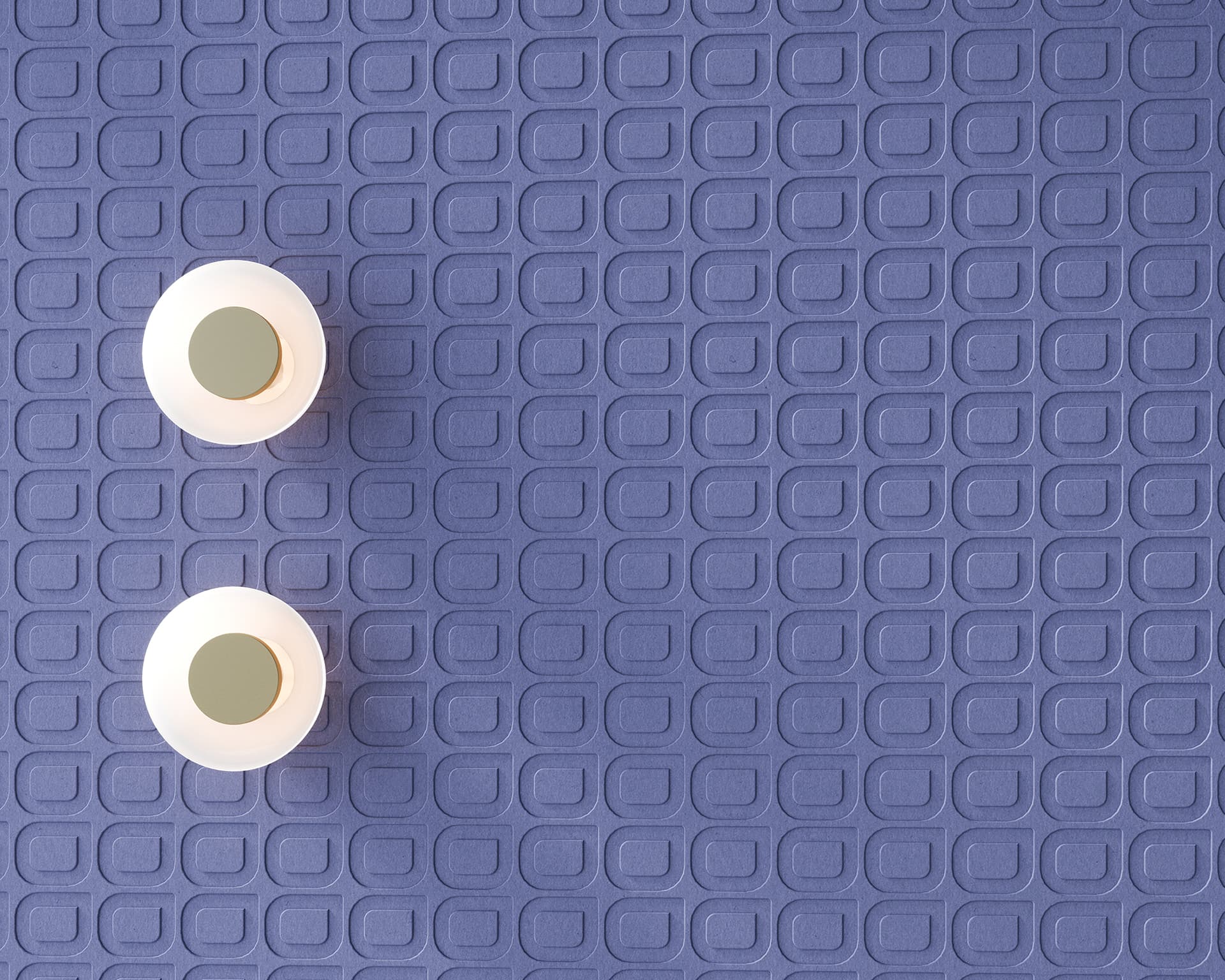 Two white round wall sconces casting light on a textured purple acoustic felt wall with a repeating geometric pattern of raised squares and ovals. The light fixtures are positioned towards the left side of the image.