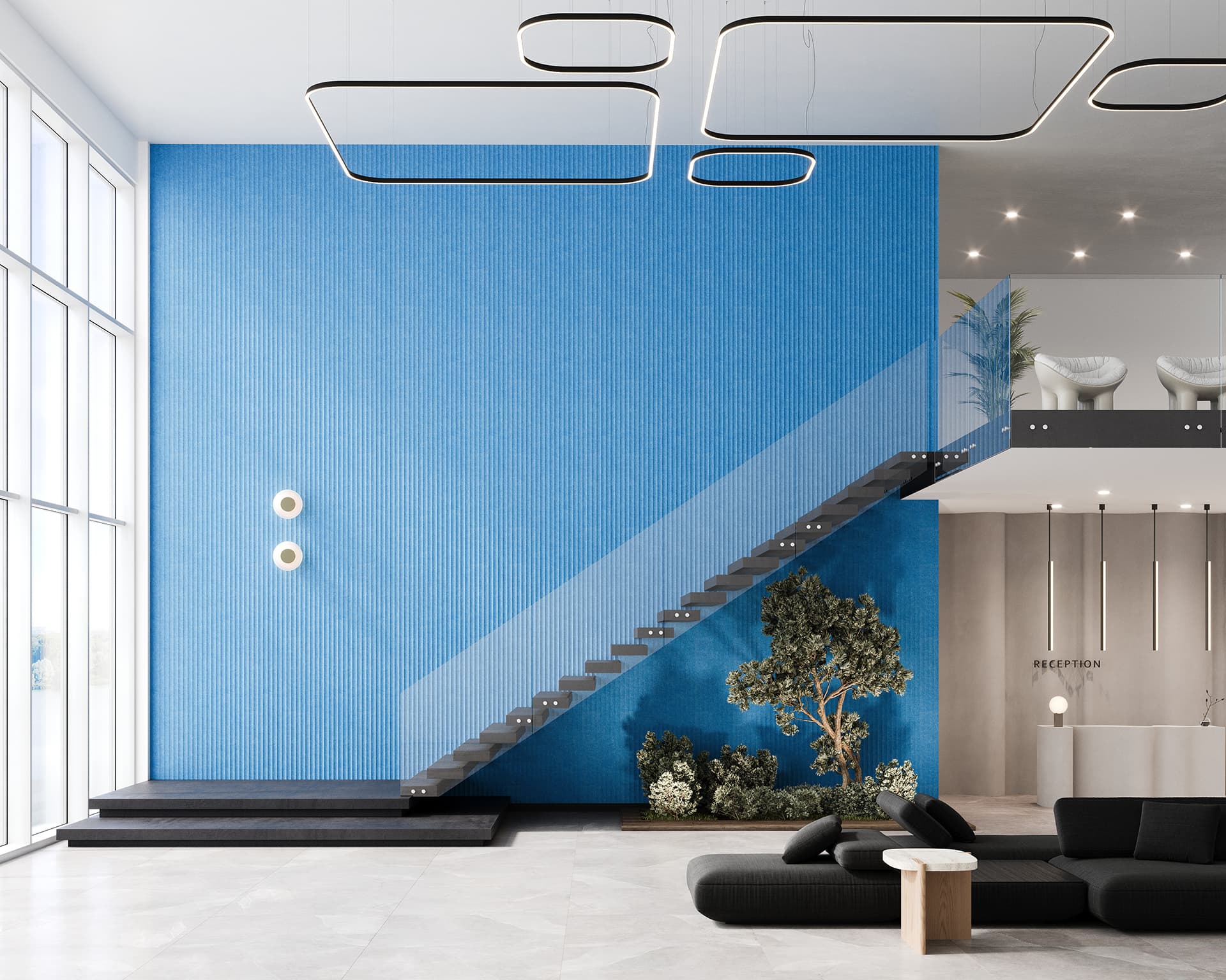 Modern interior with a floating staircase against a tall blue acoustic felt textured wall. The room features large windows, a reception area with seating, geometric ceiling lights, and potted plants, creating a sleek, minimalistic design.