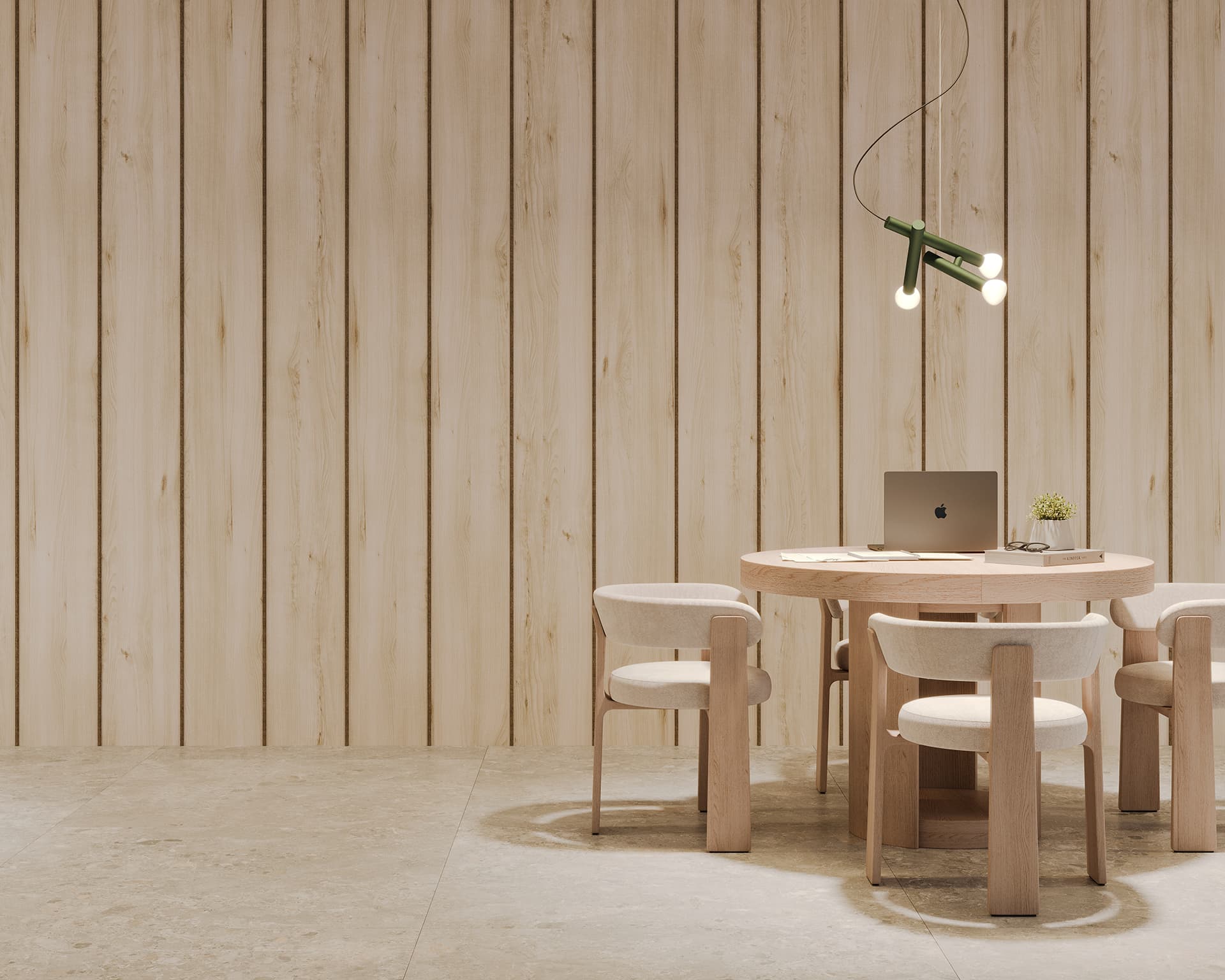 Minimalist dining area with a round wooden table, four matching chairs, and a laptop on the table. A small plant decorates the surface. A modern hanging light fixture with three bulbs hangs above. Light woodgrain acoustic felt paneling and tiled floor create a serene atmosphere.