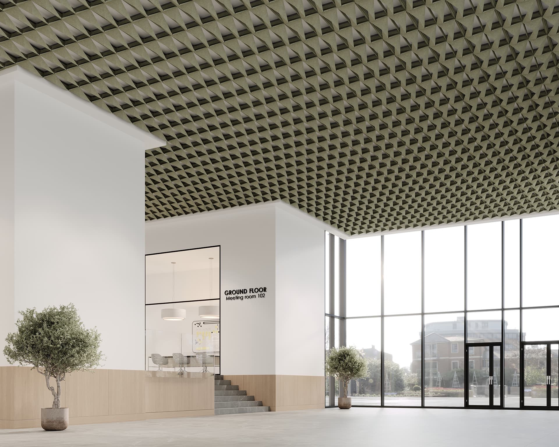 Modern interior of a spacious building with high acoustic felt ceilings and large windows. The ceiling features a geometric acoustic felt pattern, and the walls are white with wooden paneling. Two potted trees accent the space, and a meeting room is visible through glass walls.