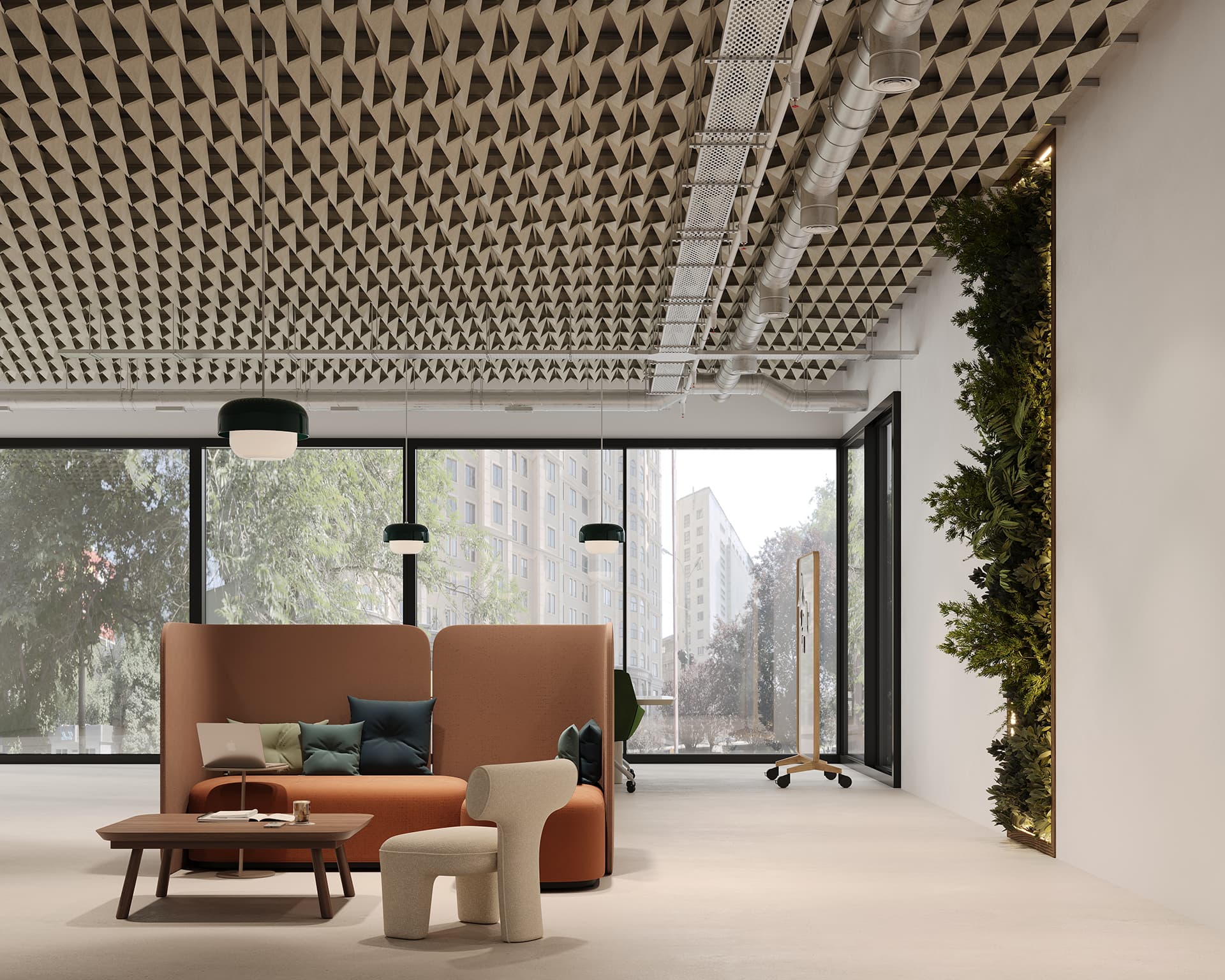 Modern office space with geometric acoustic felt ceiling design, large windows, and a vertical green wall. Features a cozy seating area with a brown sofa, green cushions, a small beige chair, and a wooden coffee table, creating a comfortable, stylish atmosphere.