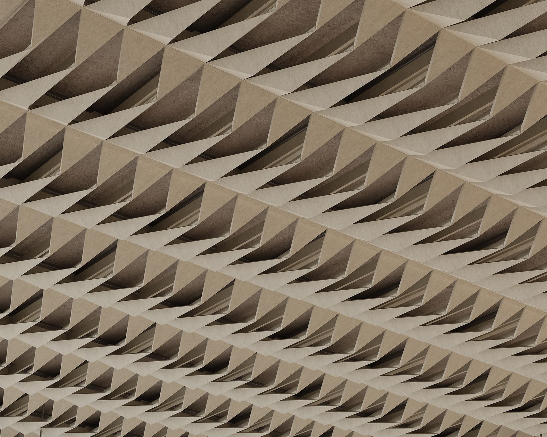 The image shows an intricate geometric pattern of triangular, beige 3D acoustic felt shapes arranged in repeating diagonal rows, creating a textured surface reminiscent of an architectural ceiling design.