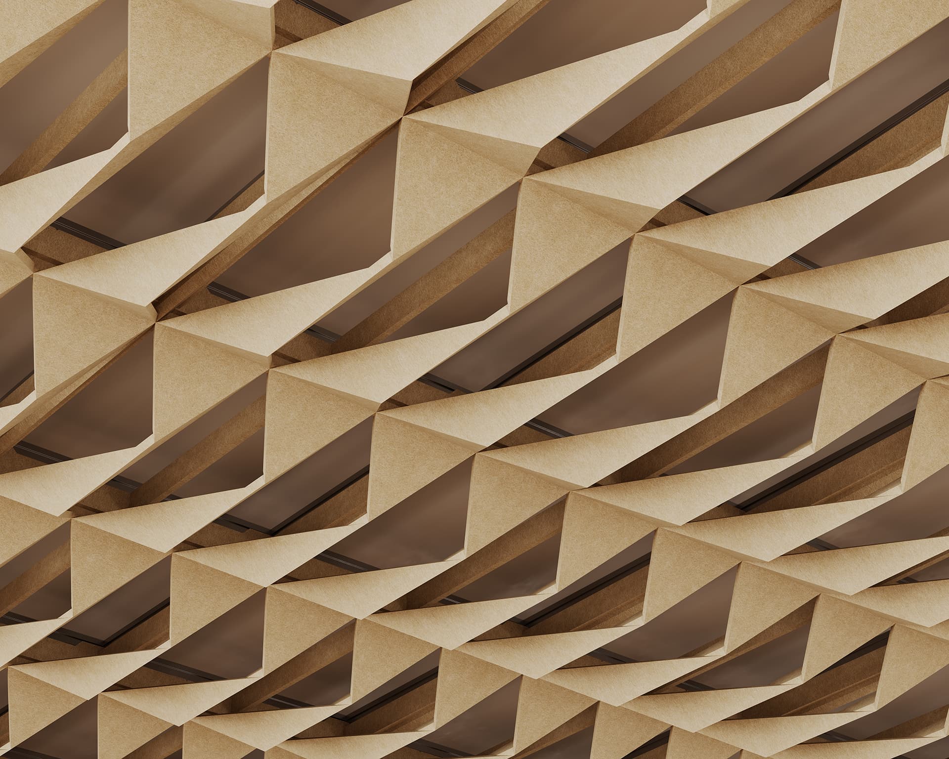 Close-up of an abstract architectural acoustic felt ceiling featuring a geometric, honeycomb-like pattern. The design consists of repeating triangular shapes in a neutral beige color, creating a textured and three-dimensional effect.