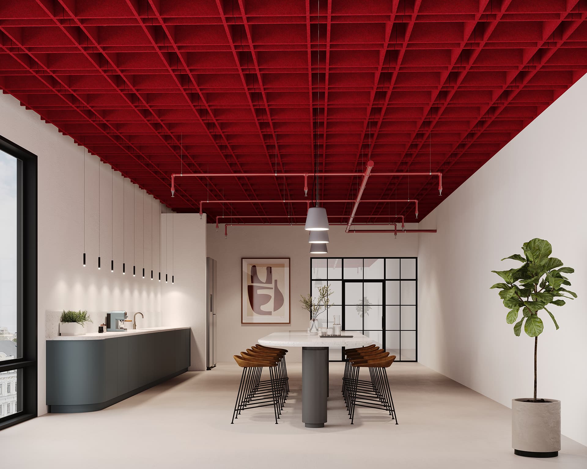 Modern office space with a long table and bar stools in the center, minimalist kitchen with dark cabinets on the left, and a potted plant on the right. The ceiling features a bold red acoustic felt grid pattern and there are large windows on the left wall.