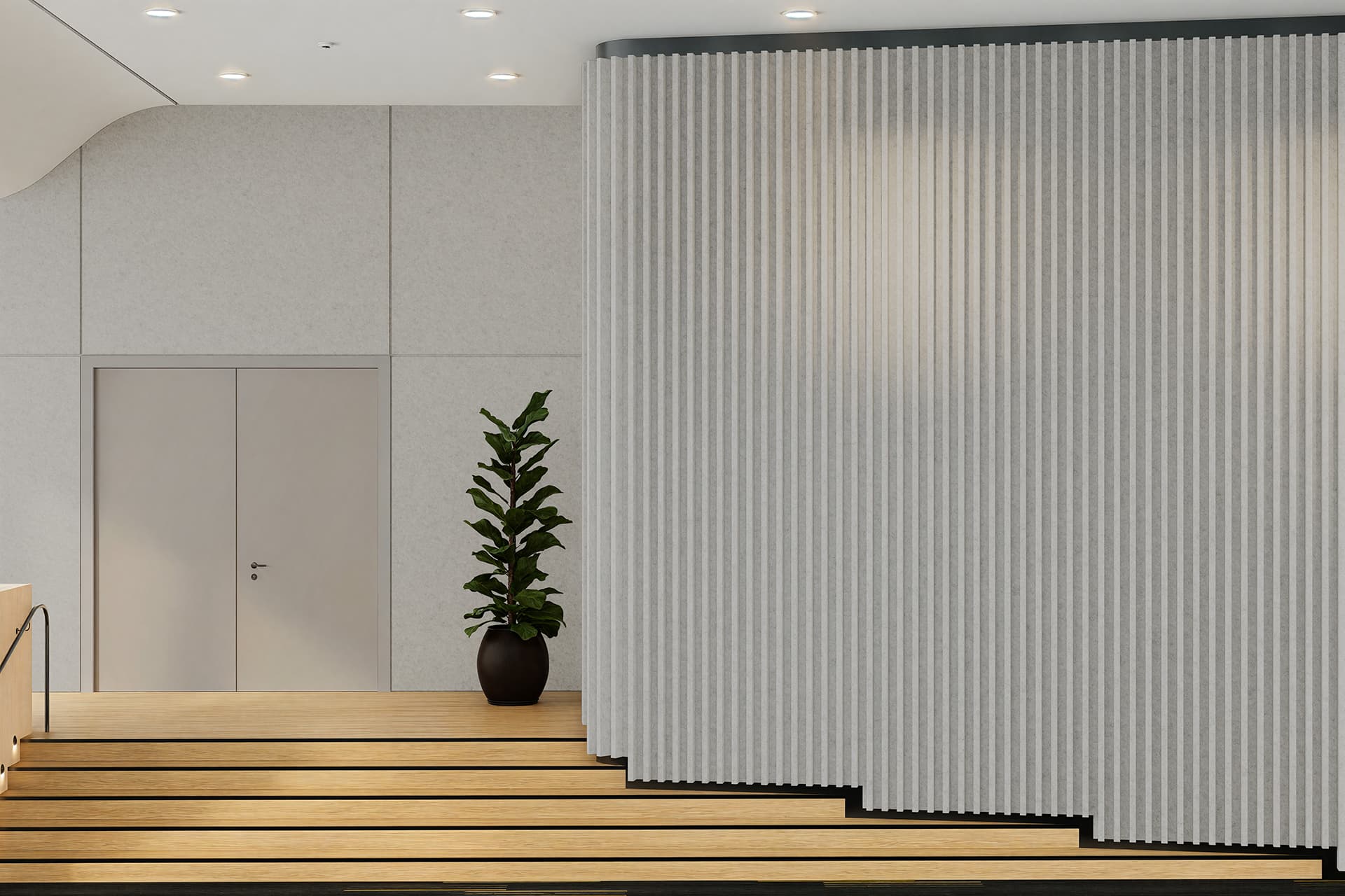 Modern interior featuring a light wood staircase with black strip accents leading to a pale gray acoustic felt wall and a closed gray door. A potted plant with large green leaves is positioned near the door, next to a white textured wall panel.